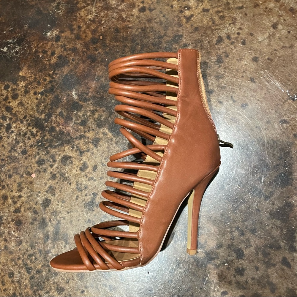 Super cute strapped heels! Only wore a couple of times!